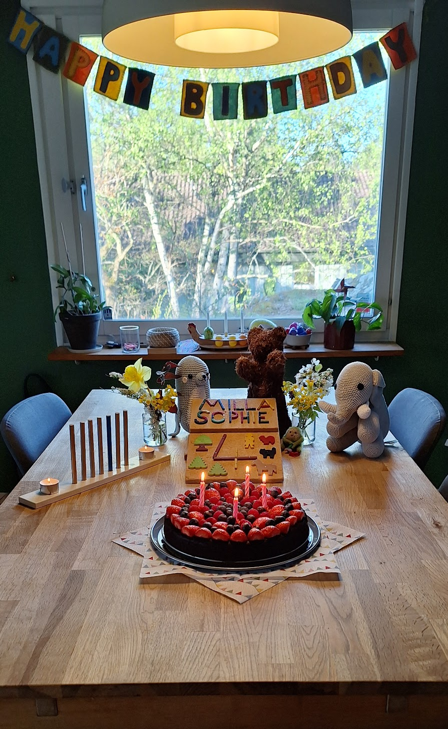 Birthday cake with berries and chocolate